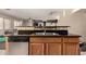 This kitchen has a stainless dishwasher, breakfast bar, lots of light and updated countertops at 2509 E Meadow Land Dr, San Tan Valley, AZ 85140