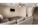 Inviting living area with comfortable seating, staircase, and neutral color palette throughout at 2509 E Meadow Land Dr, San Tan Valley, AZ 85140