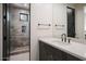 Stylish bathroom showcasing a modern vanity, sleek fixtures, and a glass-enclosed shower at 26285 N 89Th St, Scottsdale, AZ 85255