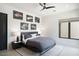 Modern bedroom featuring sleek furnishings, contemporary decor, and a comfortable king bed at 26285 N 89Th St, Scottsdale, AZ 85255