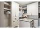 Spacious walk-in closet featuring custom shelves and ample storage for clothes and accessories at 26285 N 89Th St, Scottsdale, AZ 85255