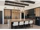 Modern kitchen features a large island with barstool seating and plenty of cabinet and countertop space at 26285 N 89Th St, Scottsdale, AZ 85255