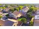 Inviting home with an oversized backyard including a small covered patio and low maintenance desert landscaping at 2990 E Franklin Ave, Gilbert, AZ 85295