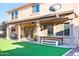 Relaxing covered patio with outdoor seating and dining area at 2990 E Franklin Ave, Gilbert, AZ 85295