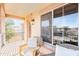 Cozy balcony with wicker seating, offering neighborhood views at 2990 E Franklin Ave, Gilbert, AZ 85295