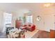Bright living room with plush seating, large windows, and stylish decor at 2990 E Franklin Ave, Gilbert, AZ 85295