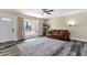 Inviting living room featuring wood-look floors, a decorative rug, and comfortable seating at 3116 W Calavar Rd, Phoenix, AZ 85053