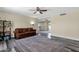 Open living room with wood-look floors, a decorative rug, and comfortable seating at 3116 W Calavar Rd, Phoenix, AZ 85053