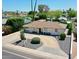 Charming home with well-maintained landscaping, a gravel driveway, and a welcoming entrance at 3505 N Miller Rd, Scottsdale, AZ 85251