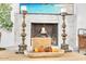 Close-up view of the fireplace with decorative elements, adding charm and warmth to the living space at 3505 N Miller Rd, Scottsdale, AZ 85251
