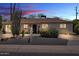 Charming home with desert landscaping, modern windows, and a welcoming entrance at 3505 N Miller Rd, Scottsdale, AZ 85251