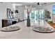 Bright kitchen featuring quartz countertop island, breakfast bar and stainless steel appliances at 3505 N Miller Rd, Scottsdale, AZ 85251