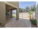 The covered patio extends to a partially enclosed yard, offering both shade and open space at 3710 E Cheery Lynn Rd, Phoenix, AZ 85018
