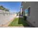 Narrow back yard with artificial turf, providing a low-maintenance outdoor area at 3710 E Cheery Lynn Rd, Phoenix, AZ 85018