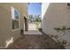 Cozy partially enclosed patio with desert landscaping, providing privacy and a relaxed atmosphere at 3710 E Cheery Lynn Rd, Phoenix, AZ 85018