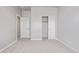Empty bedroom featuring neutral walls and carpet, along with a closet and doorway entrance at 3710 E Cheery Lynn Rd, Phoenix, AZ 85018