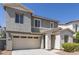Charming two-story home with a two-car garage, gray stucco, and stone accents at 3710 E Cheery Lynn Rd, Phoenix, AZ 85018