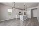 Bright kitchen with white cabinets, stainless steel appliances, and a dining area at 3710 E Cheery Lynn Rd, Phoenix, AZ 85018