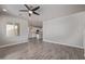 Open-concept living room with tile floors and a view of the kitchen at 3710 E Cheery Lynn Rd, Phoenix, AZ 85018