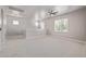 Spacious loft area with multiple windows providing ample natural light and neutral carpet at 3710 E Cheery Lynn Rd, Phoenix, AZ 85018