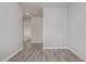 Neutral room with wood-look tile flooring and a large open space perfect for living or entertaining at 3710 E Cheery Lynn Rd, Phoenix, AZ 85018