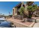 Stucco condo with lovely landscaping, balconies, and decorative stone accents at 3825 E Camelback Rd # 152, Phoenix, AZ 85018