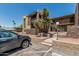 Charming apartment building exterior with desert landscaping and convenient parking at 3825 E Camelback Rd # 152, Phoenix, AZ 85018