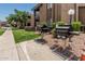 Outdoor community grills with a manicured lawn and landscaping at 3825 E Camelback Rd # 152, Phoenix, AZ 85018