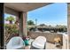 A patio space with seating and potted plants on a sunny day at 3825 E Camelback Rd # 152, Phoenix, AZ 85018