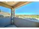 Covered balcony with stone pillar offers neighborhood views at 3903 E Melody Dr, Phoenix, AZ 85042