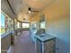 Outdoor kitchen on the spacious covered balcony including stainless grill, refrigerator, and scenic views of the surrounding area at 3903 E Melody Dr, Phoenix, AZ 85042