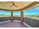 Serene balcony framed by stone pillars, perfect for enjoying the unobstructed vistas of the desert and distant community at 3903 E Melody Dr, Phoenix, AZ 85042