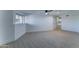 Basement with vinyl floors and closet storage space; potential living or recreation room at 3903 E Melody Dr, Phoenix, AZ 85042