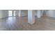 Spacious basement area with sliding glass doors leading to the exterior and stairs to upper level at 3903 E Melody Dr, Phoenix, AZ 85042