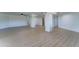 Expansive basement featuring durable floors and multiple pillars, offering versatile living and storage space at 3903 E Melody Dr, Phoenix, AZ 85042