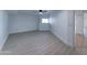 Unfinished basement with potential for customization; features vinyl floors and natural light at 3903 E Melody Dr, Phoenix, AZ 85042