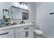 Elegant bathroom features a sleek vanity, black fixtures, and stylish decor for a touch of luxury at 3903 E Melody Dr, Phoenix, AZ 85042