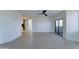 Bedroom with sliding glass doors, ensuite and modern interior at 3903 E Melody Dr, Phoenix, AZ 85042