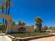 Welcome to The Legacy Golf Resort, showcased by its elegant entrance and landscaping at 3903 E Melody Dr, Phoenix, AZ 85042