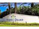 Welcome to the Arizona Grand Resort, with its beautiful entrance and landscaping at 3903 E Melody Dr, Phoenix, AZ 85042