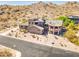 Beautiful single Gathering home with desert landscaping and circular patio nestled in mountains at 3903 E Melody Dr, Phoenix, AZ 85042