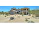 Stunning desert home featuring a unique architectural design and beautiful desert landscaping at 3903 E Melody Dr, Phoenix, AZ 85042