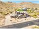 Gorgeous desert home with desert landscaping and circular patio nestled in the mountains at 3903 E Melody Dr, Phoenix, AZ 85042