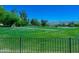 Experience scenic views from this lush green golf course community at 3903 E Melody Dr, Phoenix, AZ 85042