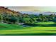 Expansive golf course view with lush green fairways and scenic mountain backdrop at 3903 E Melody Dr, Phoenix, AZ 85042