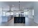 Spacious kitchen with a beautiful island, stainless steel appliances, and plenty of room to cook and entertain at 3903 E Melody Dr, Phoenix, AZ 85042