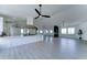 Open floor plan showcasing modern kitchen with stainless hood vent and large island, perfect for entertaining at 3903 E Melody Dr, Phoenix, AZ 85042