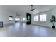Bright living room features an elegant fireplace, modern lighting, and slider door access at 3903 E Melody Dr, Phoenix, AZ 85042