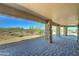 Covered patio with stone columns and a beautiful view of the natural desert landscape at 3903 E Melody Dr, Phoenix, AZ 85042