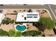 Aerial view showcasing the home's layout, pool, solar panels, and well-maintained surroundings at 4032 E Cannon Dr, Phoenix, AZ 85028